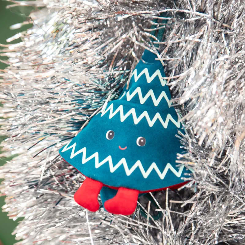 Gioco per bambini a forma di elfo fosforescente reversibile che diventa un albero di Natale